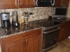 Golden Thunder Countertop with Tile Backsplash